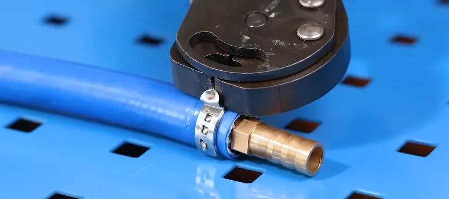 Close-up of a plumbing specialty tool in use for Lakewood Plumbing Blog