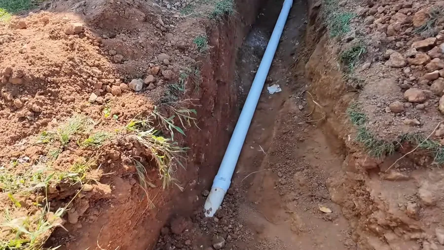 New sewer pipe installed along a trench wall for Sewer Line Replacement in Lakewood, CA